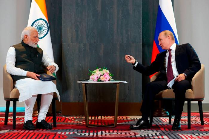 Vladimir Putin, right, spoke with Indian Prime Minister Narendra Modi at the Uzbekistan summit in September. 