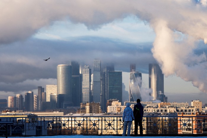 Steam from power plants rises over office blocks at the Moscow International Business Centre