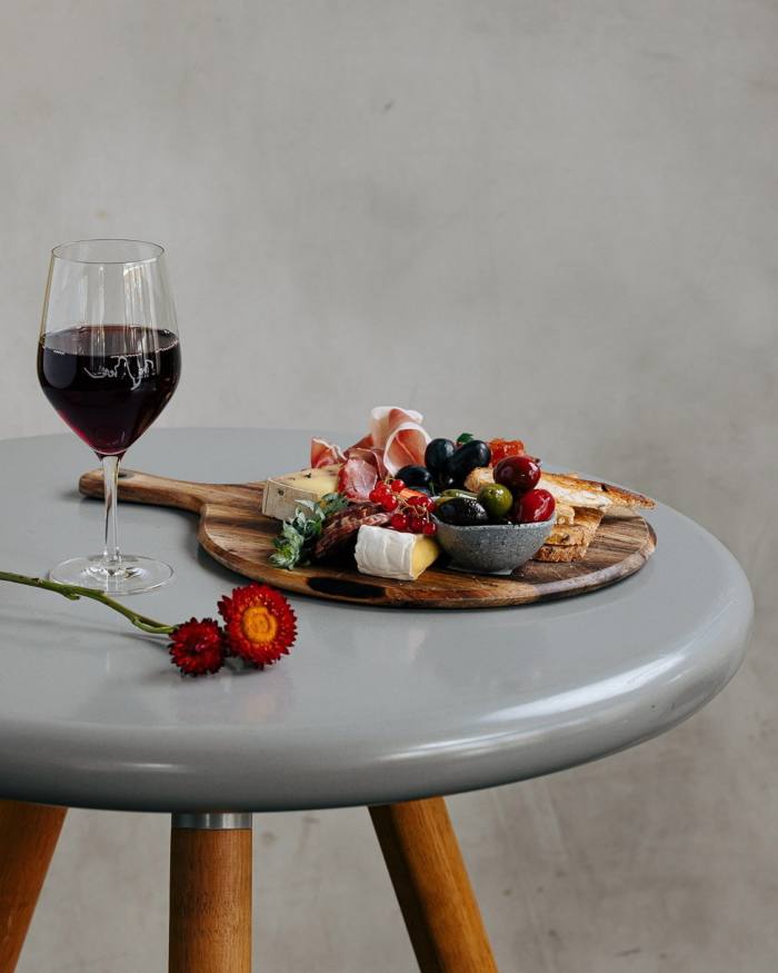 Red-wine kangaroo salami and a glass of red wine at Pawa Café & Bar