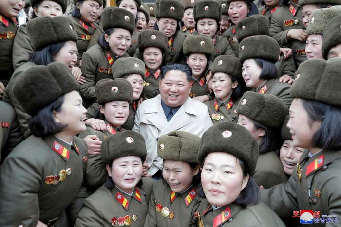 Kim Jong Un with female soldiers. The North Korean leader is moving to reimpose ideological orthodoxies redolent of the reign of his grandfather, founding leader Kim Il Sung