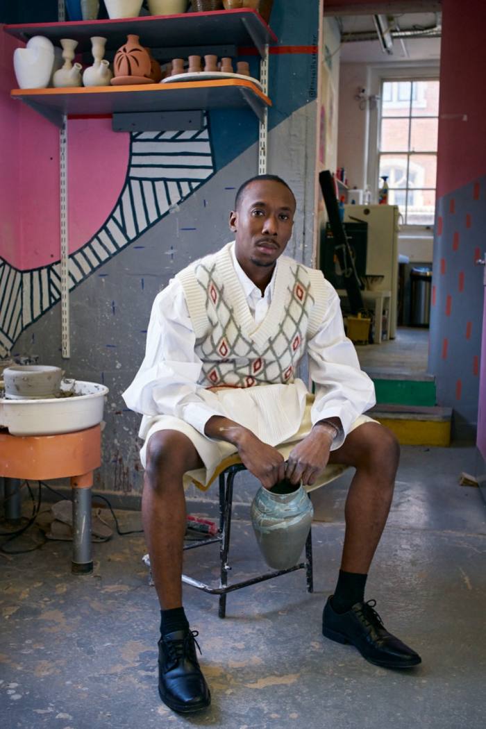 Ceramicist Ronaldo Wiltshire wearing SS Daley wool vest, £390, and wool shorts, £380, matchesfashion.com