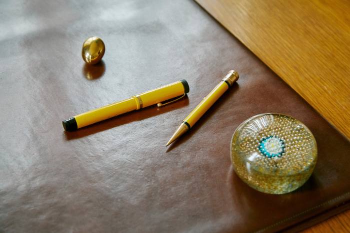Left to right: Carl Auböck brass paperweight, £185.  Vintage 1926 Parker Duofold set, £3,750.  Vintage Murano Paperweight, £95