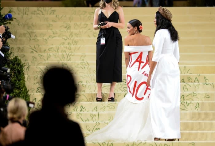 Alexandria Ocasio-Cortez, the New York lawmaker, attends a gala dinner at the Metropolitan Museum of Art with ‘tax the rich’ written in red letters across her white dress