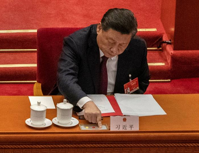 Chinese President Xi Jinping casts his vote on the national security legislation for Hong Kong in Beijing, China, on May 28 2020