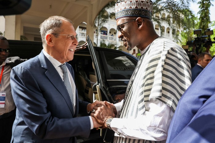 Sergei Lavrov is greeted by Abdoulaye Diop