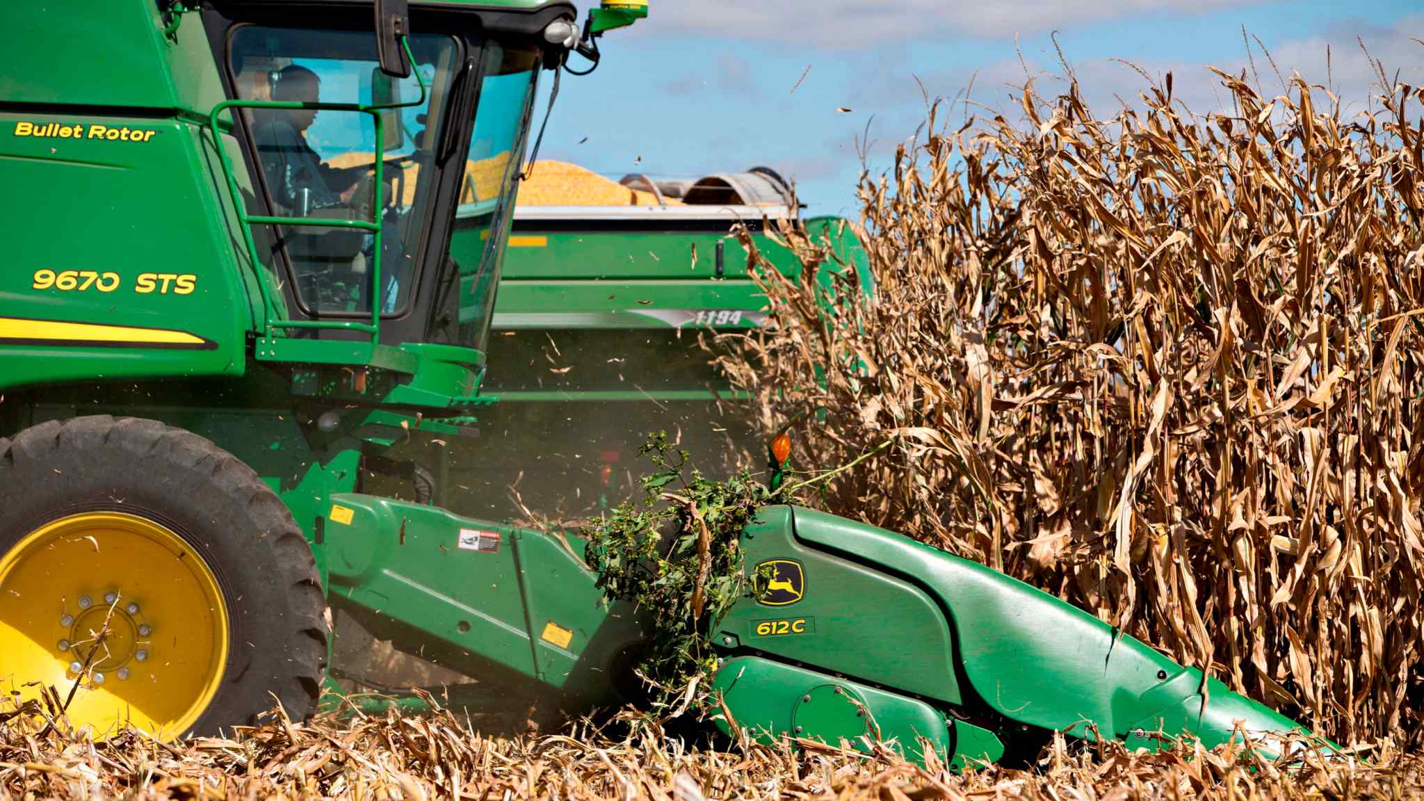 Live news updates: Deere cuts profit forecast on higher costs but optimistic on 2023 orders