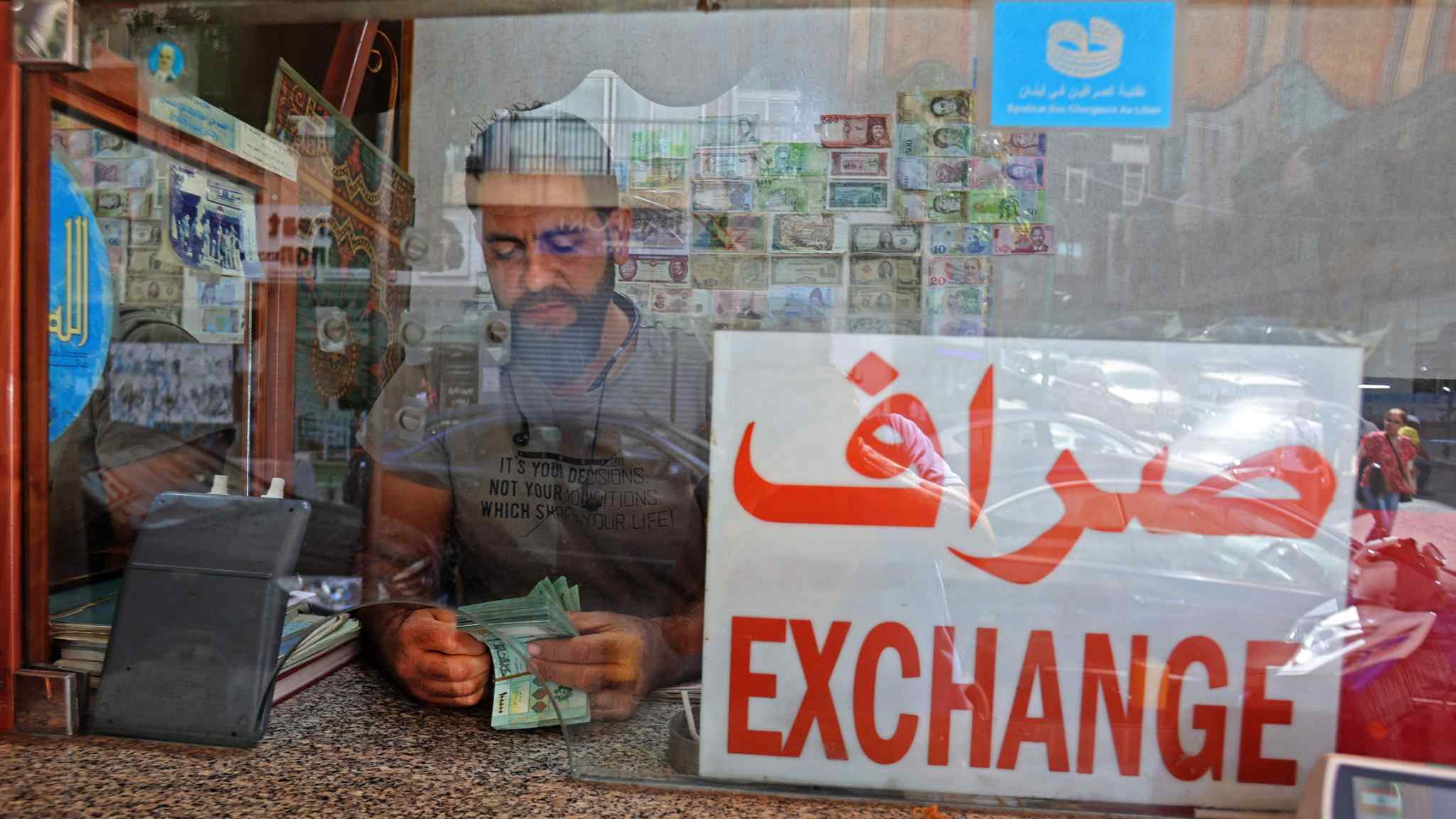 Live news: Lebanon re-pegs currency to help tackle its economic crisis