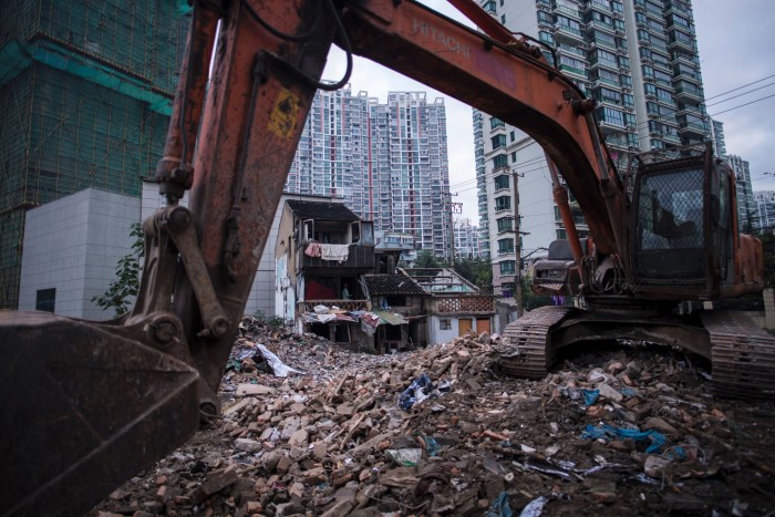 Old residential buildings are demolished to make space for high-rise buildings in Shanghai