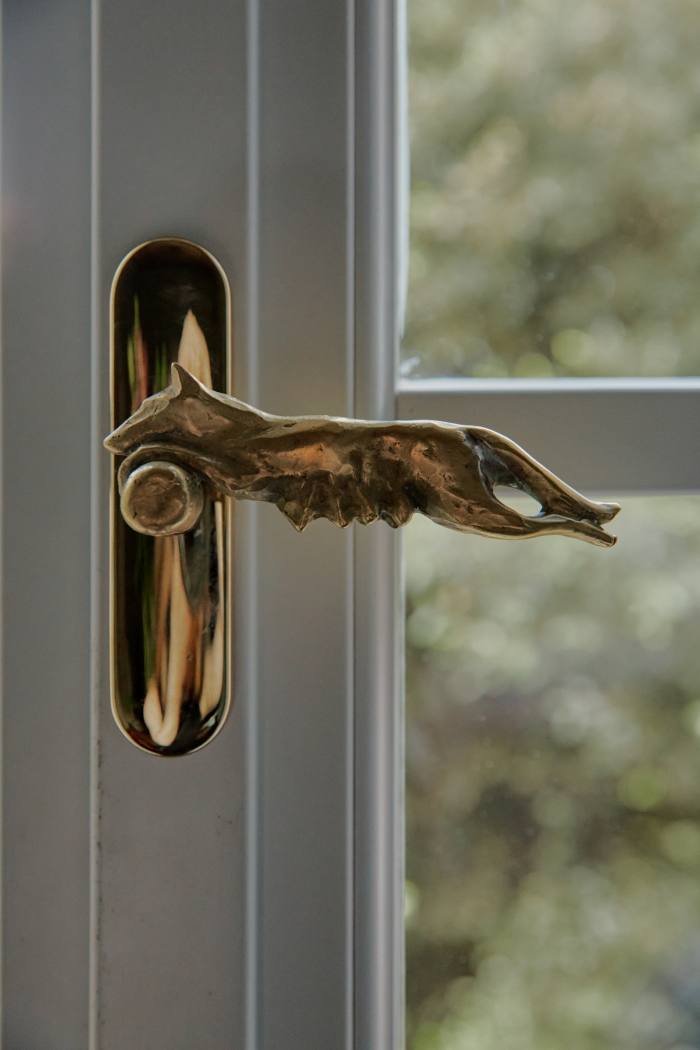 A 2014 bronze she-wolf window handle by Canevari