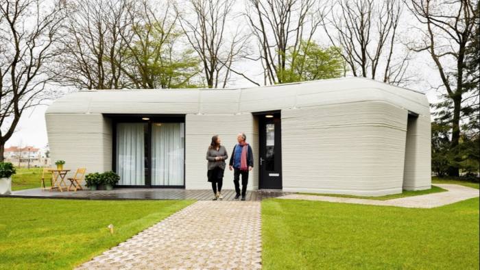Elize Lutz and Harrie Dekkers are tenants of a 3D-printed 1,000 sq ft bungalow in Eindhoven, the Netherlands
