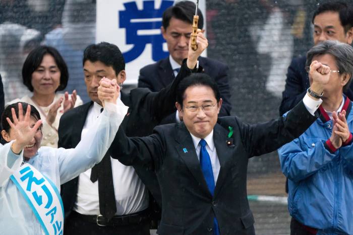 Japan’s prime minister Fumio Kishida, centre, rallies with a candidate after making a speech in Urayasu, Chiba, Japan, on Saturday