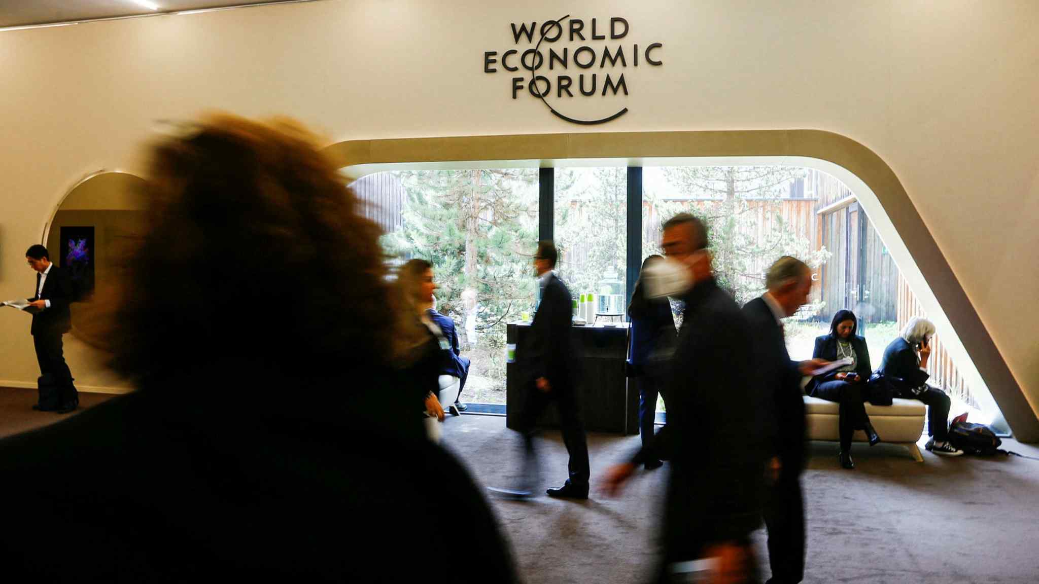 Sombre and uncertain mood descends on Davos