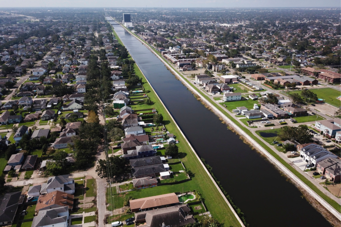 An aerial image shows the 17th Street Canal Floodwall, the largest and most important drainage canal in New Orleans, Louisiana on August 31, 2021 in the aftermath of Hurricane Ida