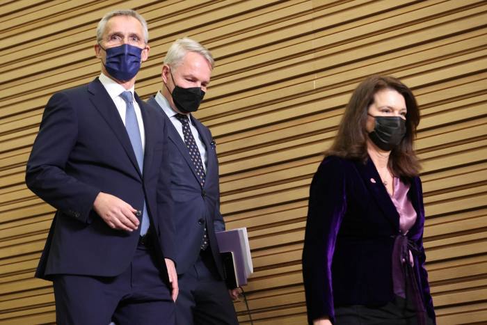 Nato secretary-general Jens Stoltenberg, left, Finnish foreign minister Pekka Haavisto and his Swedish counterpart Ann Linde at Nato headquarters in Brussels, Belgium in January 2022