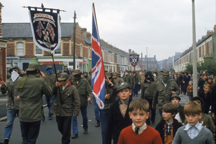 Masked members of the Ulster Defence Association, a loyalist paramilitary group, parading in Belfast in 1972