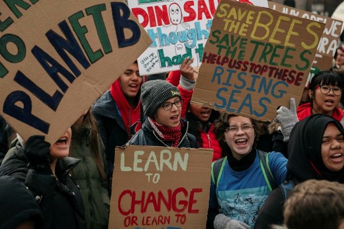 Environmental campaigners from the Sunrise Movement and other groups protest in New York. The movement backed Joe Biden in the presidential election because of his green plans