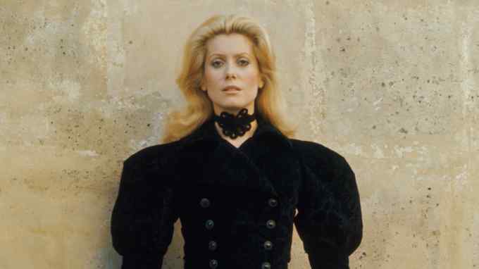 Catherine Deneuve wears the Saint Laurent corduroy coat, auction estimate €1,500-€2,000