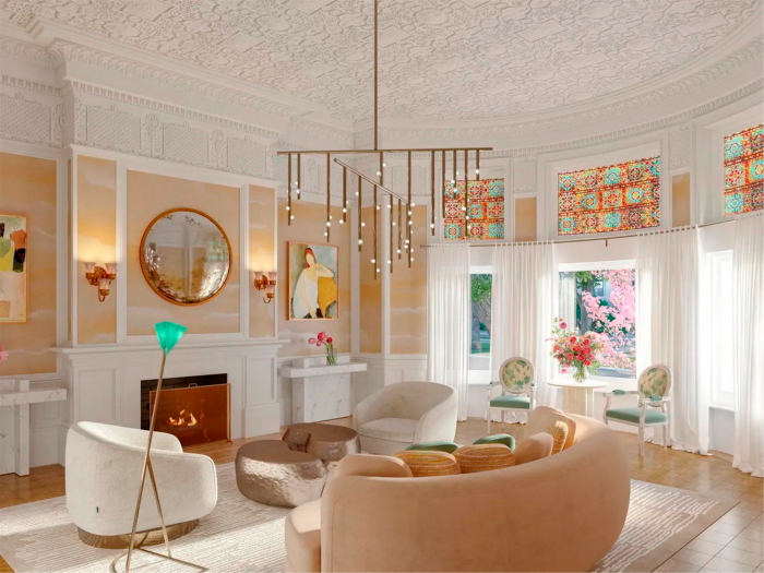 Luxuriously decorated living room with stained glass windows and chandelier at Tiffany Air Mansion in Back Bay, designed by Louis Comfort Tiffany, $17 million