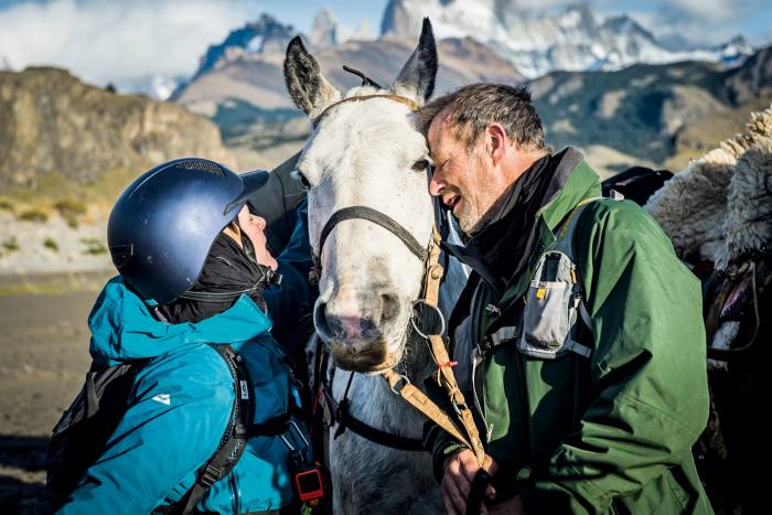 British riders Laura Redvers and Robert Skinner in front of Mount Fitz Roy at the end of the race