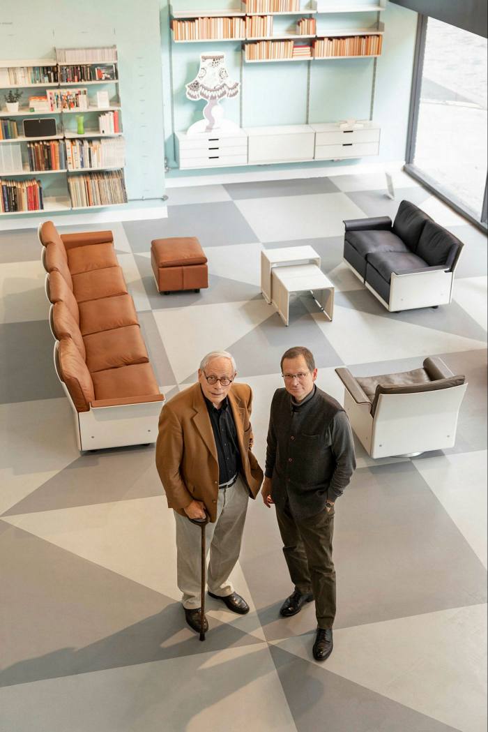 Vitsoe managing director Mark Adams (right) with Dieter Rams, in the London shop 