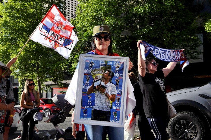 Serbian supporters of Djokovic joined anti-vaccination protesters alongside supporters of refugees outside the Park Hotel in Melbourne