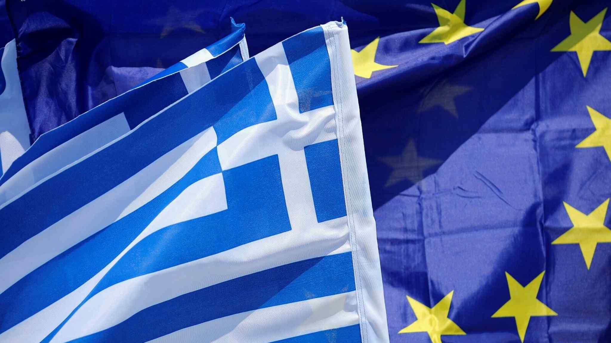 Live news updates: EU ends enhanced scrutiny of Greek economy after 12 years