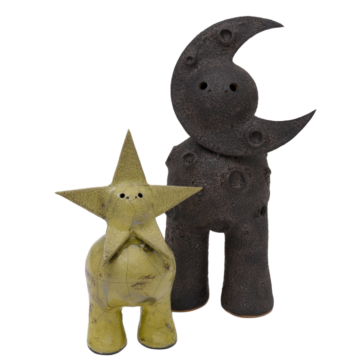 Humanoid clay figures, one with a star head, one with a crescent moon