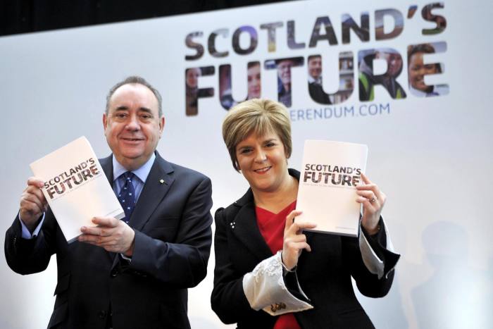 Nicola Sturgeon with mentor Alex Salmond in 2013; the two fell out, hurting SNP unity