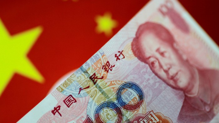 A Chinese flag and a renminbi note