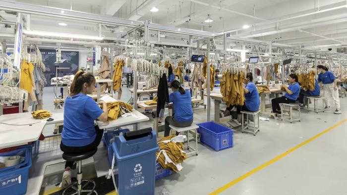 Employees work at a garment factory in Hangzhou, China, last month