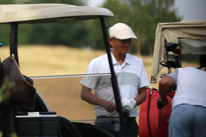 Jack Ma playing golf near Prague, Czech Republic in July