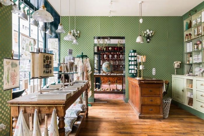 Marin Montagut’s rooms are lined with antique shelving and apothecary-style cabinets