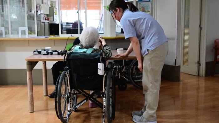 An elderly woman in a care home