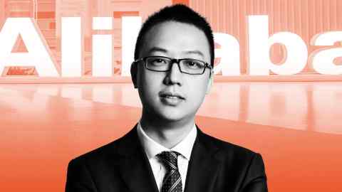 Wu Yongming with Alibaba logo as background