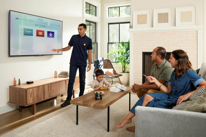 Enjoy Technology's image of a family learning how to use a gadget