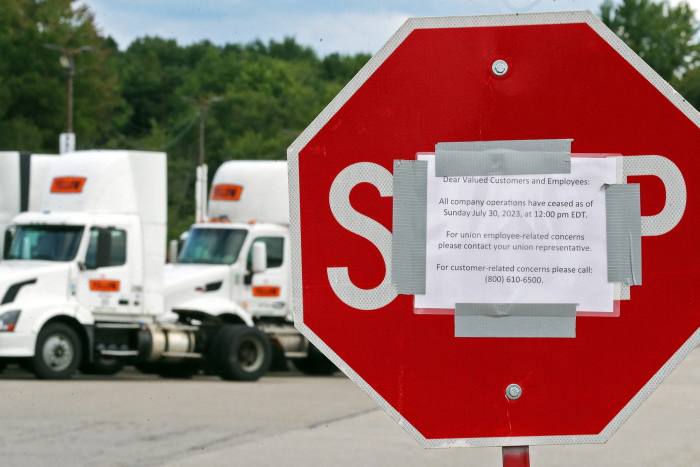 A sign posted at the Yellow truck terminal in Copley, Ohio, after the company announced it was ceasing operations on July 30
