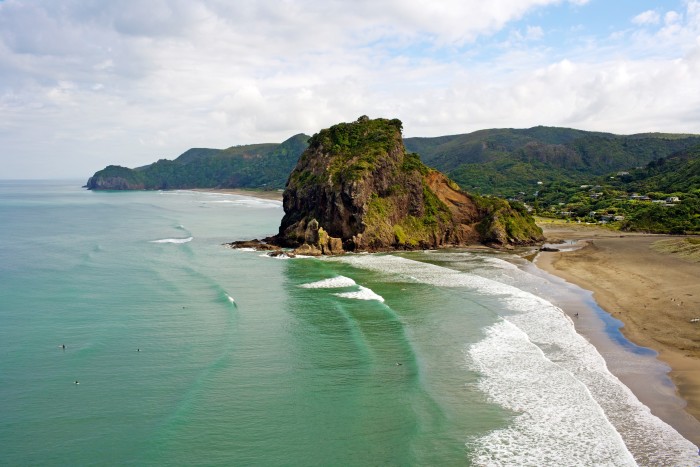 Lion Rock at Piha Beach, one of Auckland's most popular surf spots