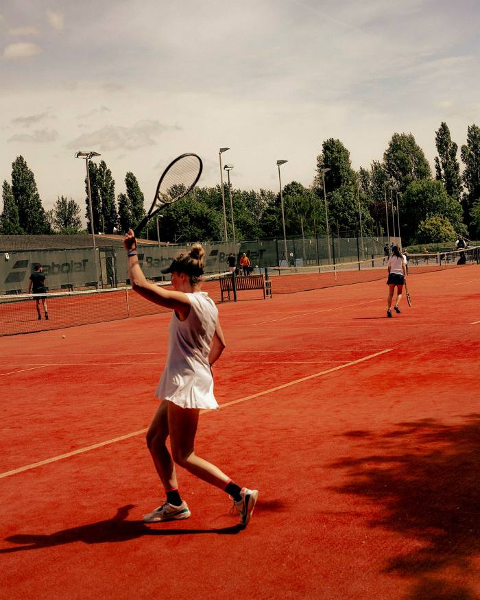 Young tennis players on one of the Duke Meadows tennis courts