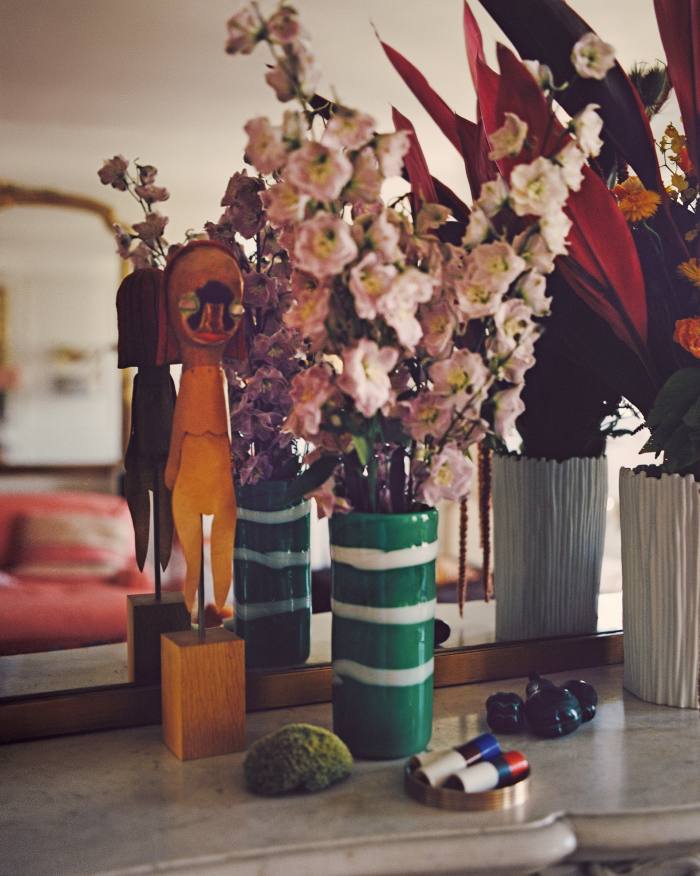 From left: an Izumi Kato sculpture, found moss, a Venini vase, Rouge Hermès limited edition AW21 lipsticks, malachite pears and a Bernardaud Limoges-porcelain vase