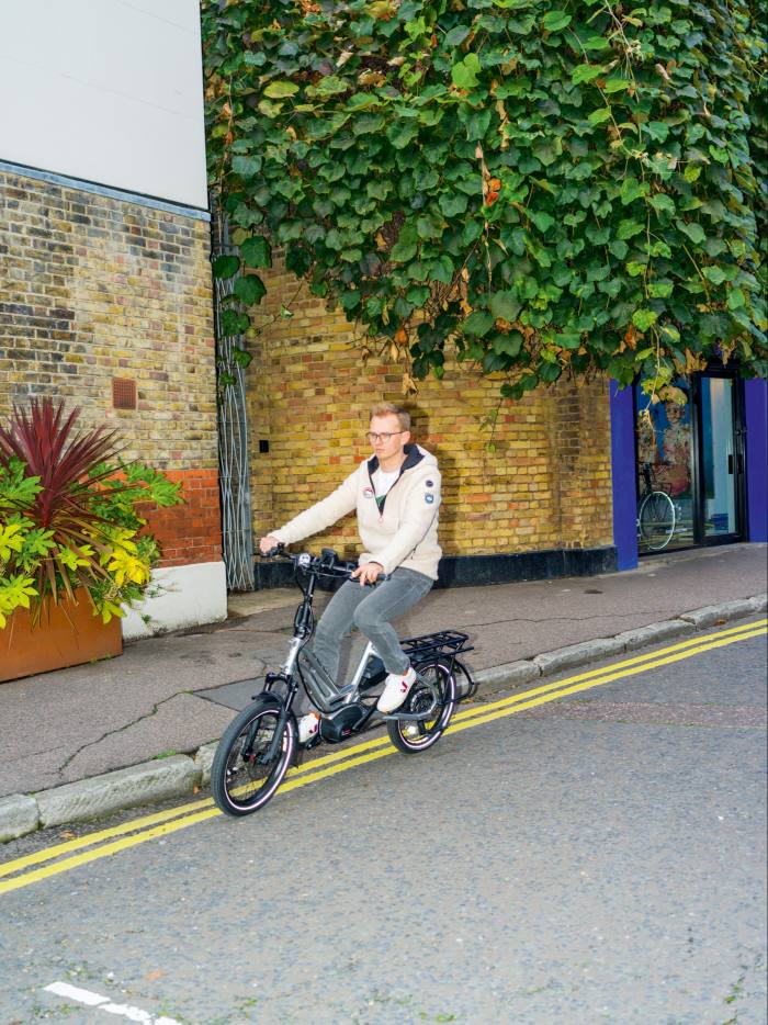 the author on a Tern HSD S+, £5,300, from fullycharged.com. He wears Café du Cycliste fleece Ondine top, £176, and APC denim Petit Standard jeans, £175, from matchesfashion.com