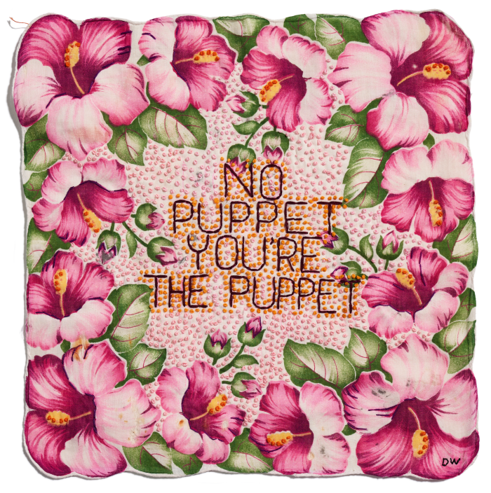 Diana Weymar’s Tiny Pricks global art project hand-embroiders Trump quotes on vintage textiles