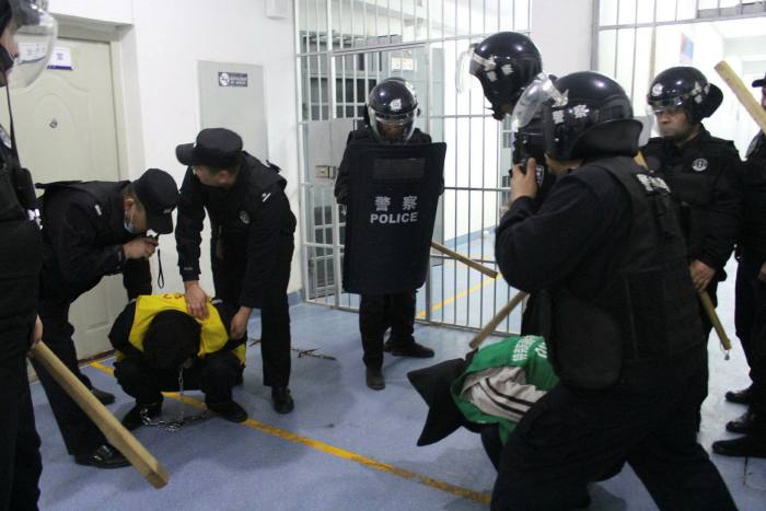 An anti-riot drill at a detention center in Xinjiang 