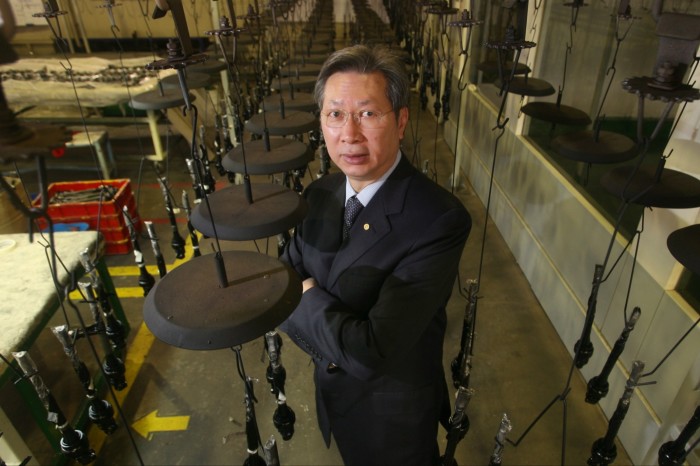 Danny Lau of Kam Pin Industrial stands on the factory floor