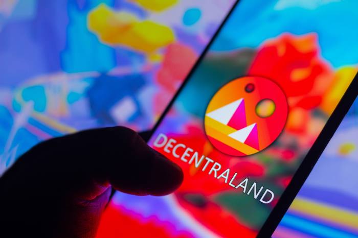 The Decentraland logo displayed on a smartphone