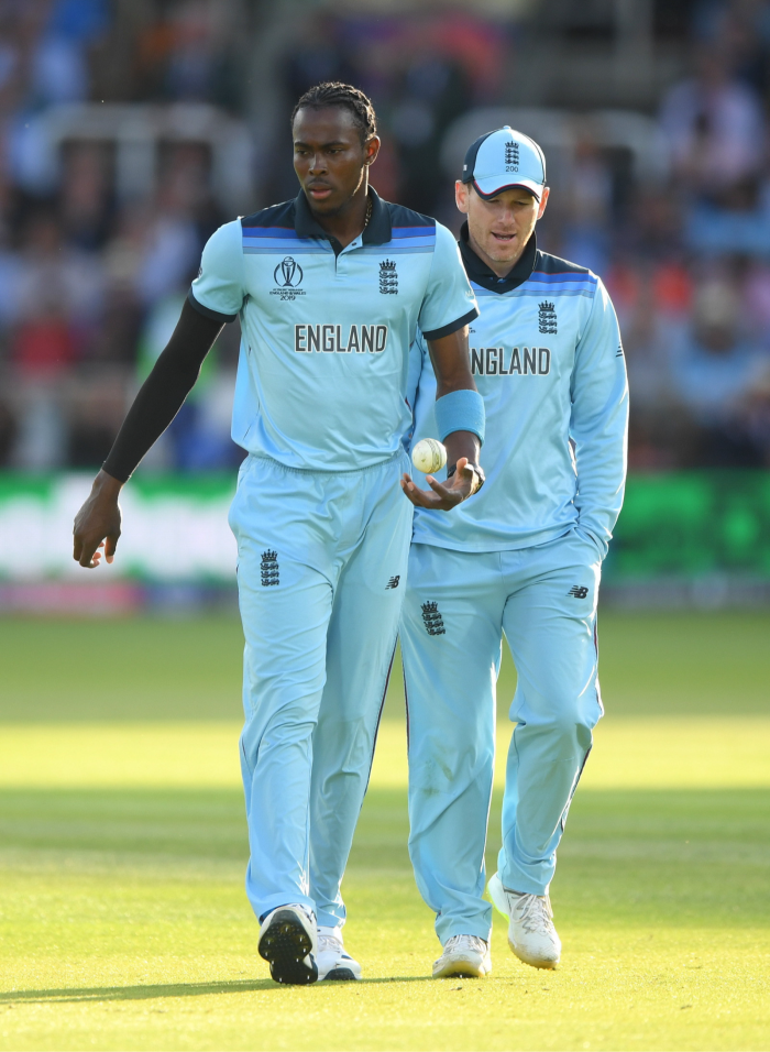 England bowler Jofra Archer talks to captain Eoin Morgan on the pitch at Lords
