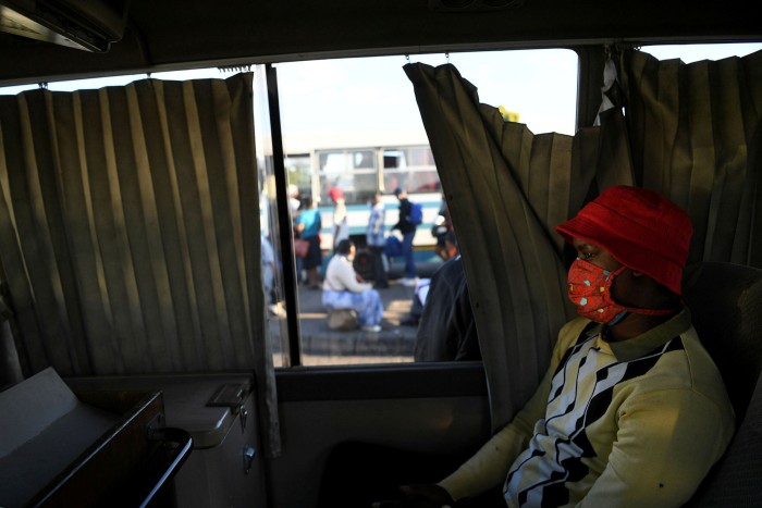 A commuter wears a face mask on board a bus in Gaborone, Botswana