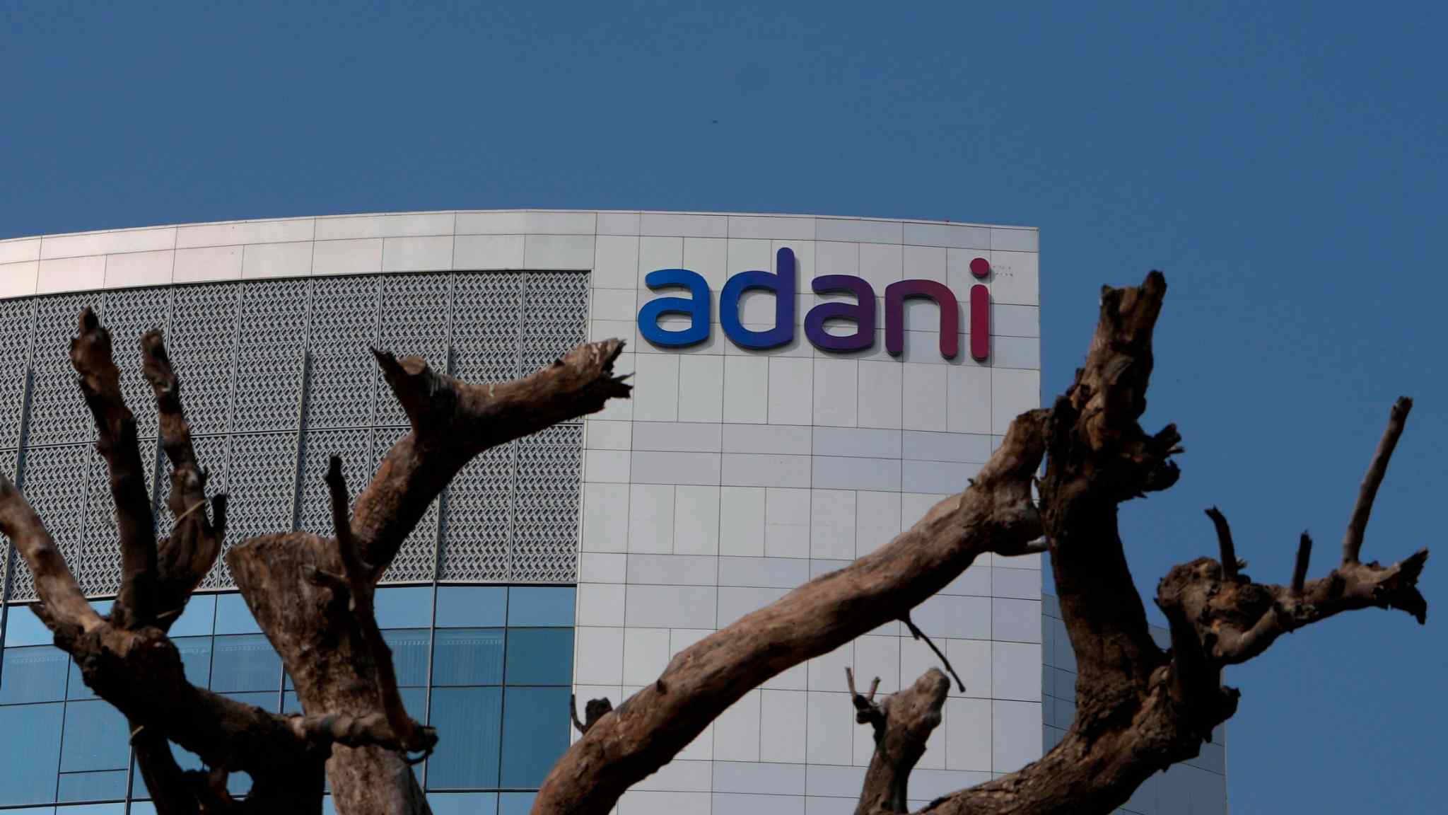 Live news: Abu Dhabi-based IHC to invest $400mn in Adani share offering