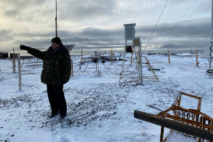 Russian meteorological official with weather and climate monitoring equipment in Pevek