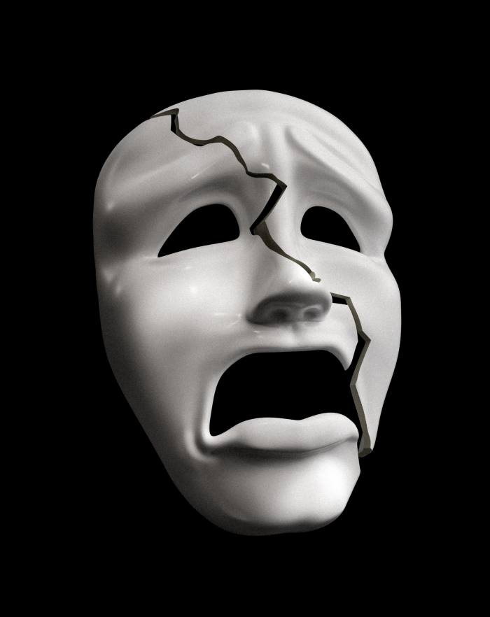 The kind of white mask worn by actors in the theatre to express tragedy. To add to the sense of sorrow, this mask is has a crack running down its centre 