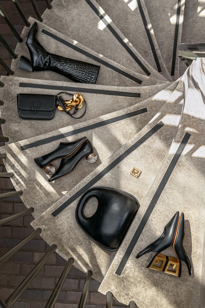 From far left: No 21 by Alessandro dell’Acqua leather boots, POA. JW Anderson calfskin Midi Anchor bag, £710. Neous leather Orchis heels, £495. Lemaire vegetable-tanned leather Egg bag, £1,505. Fendy gold metal FF earrings, £490. Givenchy leather Triangle slingback pumps, €650